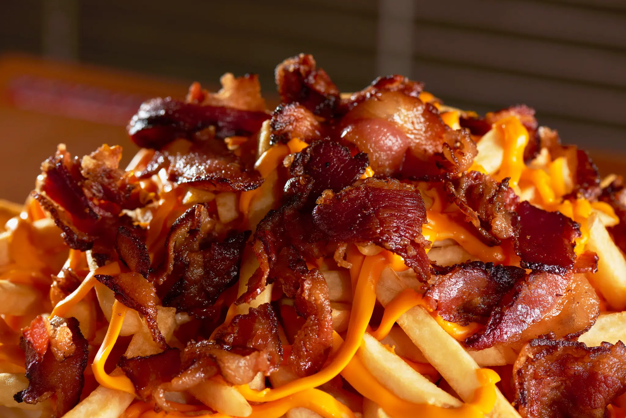 Batata com queijo, cheddar e bacon Quinteiros